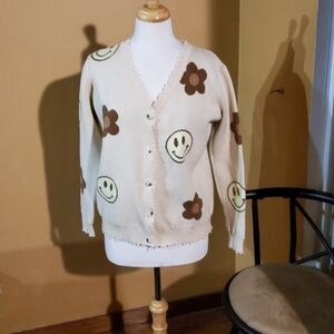 Playful Cream Cardigan with Smiley and Flower Accents